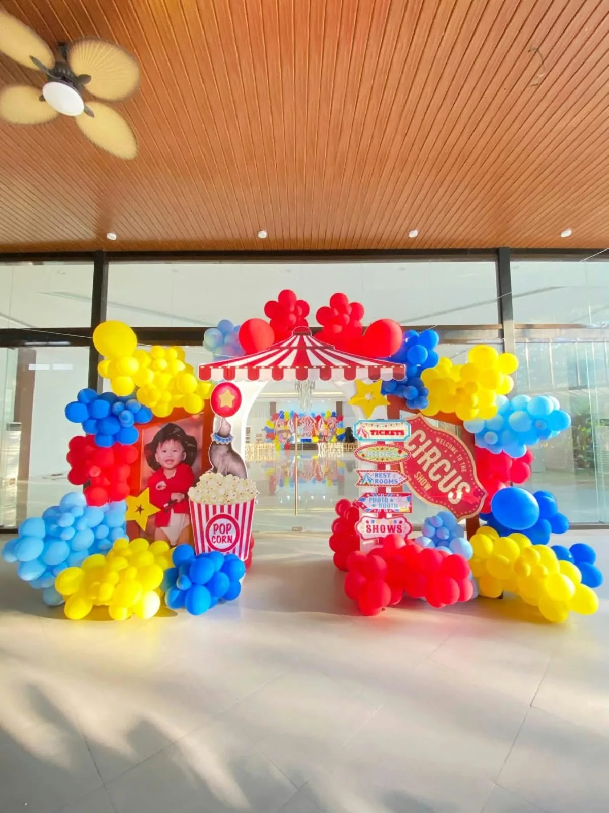 Carnival Circus Theme Stage Decoration — Red & White Carnival Backdrop with Balloon Arch photo 2 of 5
